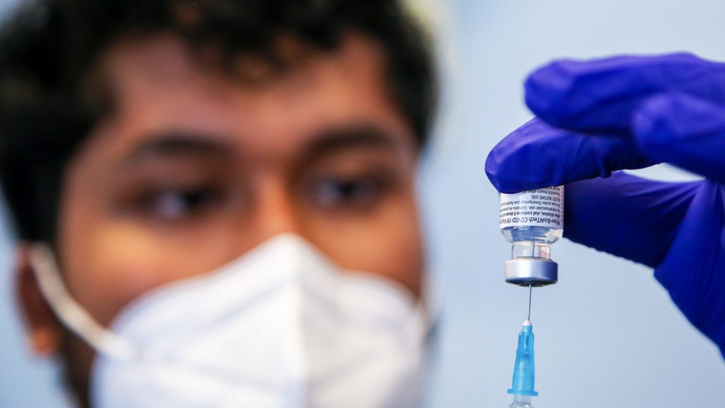 Nurse preparing a vaccine