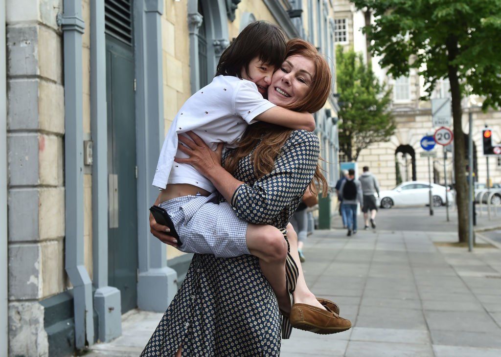 charlotte caldwell hugging her son billy