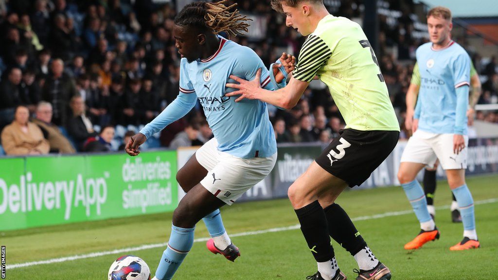 Terrell Agyemang (left), pictured playing for Manchester City Under-21s, will join Middlesbrough next month