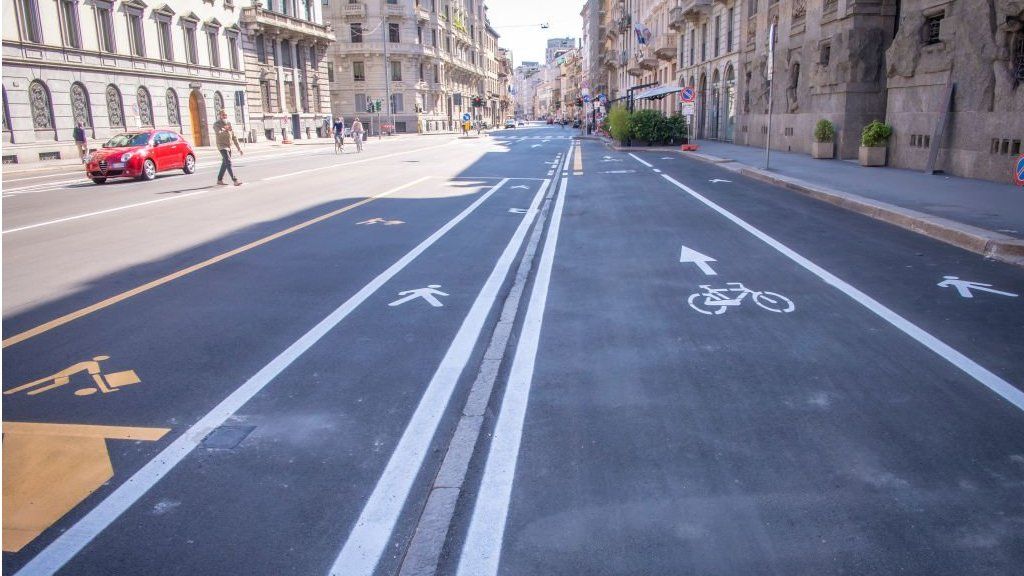 A new scheme in Milan re-allocated car parking space for pedestrians and cyclists