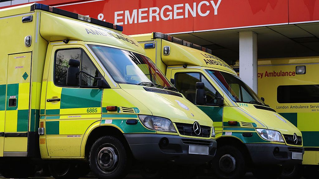 Ambulances parked outside a hospital