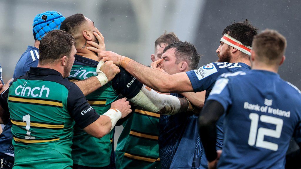 Players from both teams scrap during the second half