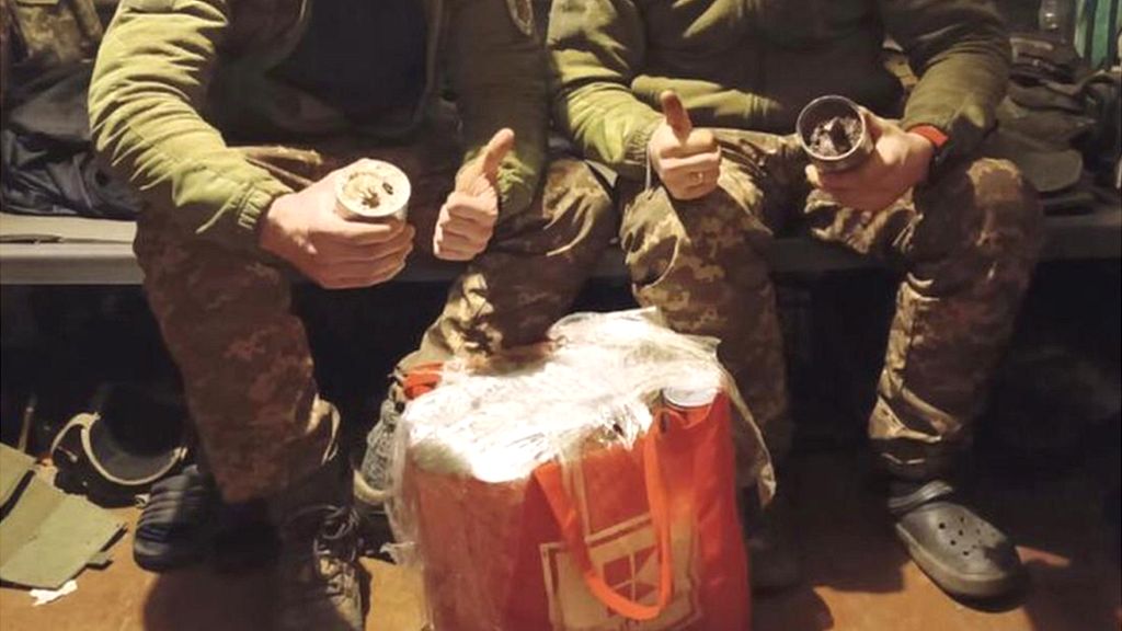 Soldiers in Ukraine with beeswax candles