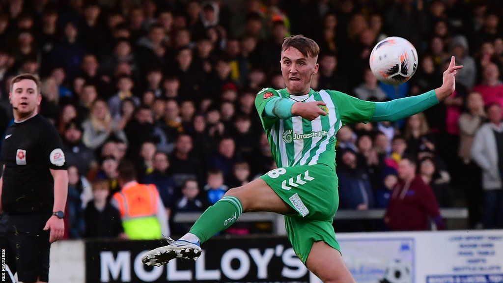 Jamie Andrews kicks the ball during a match for Yeovil Town