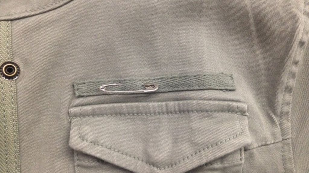 why wear a safety pin