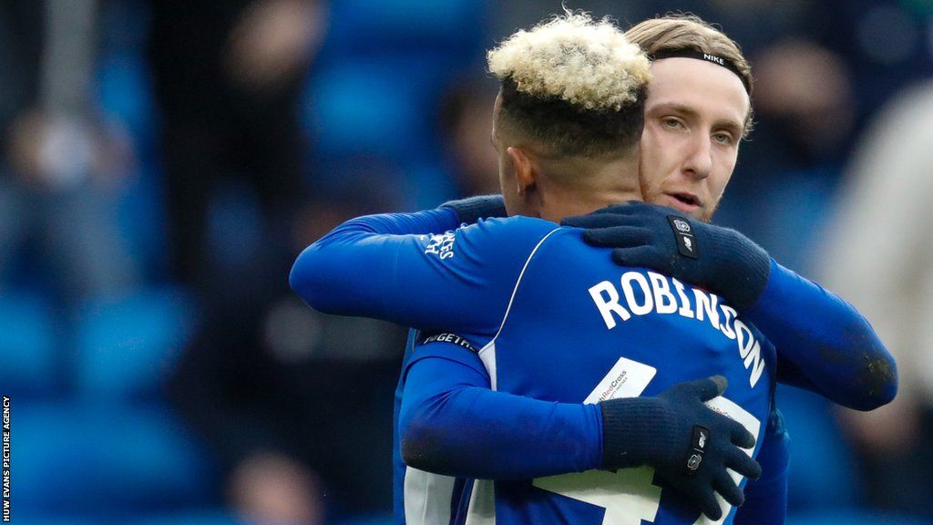 Callum Robinson celebrates with Josh Bowler