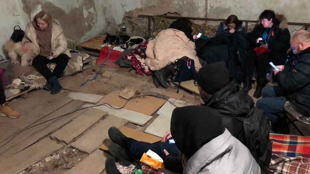 Ukrainian civilians sheltering in basement