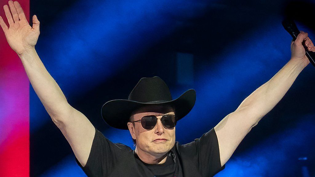 A photograph of Musk in a cowboy hat and sunglasses