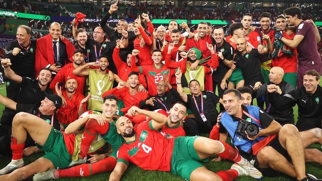 Morocco players celebrate in a team photo