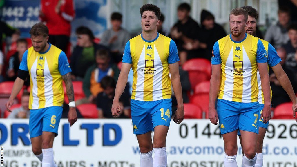 Torquay's players look left shell-shocked after conceding two late goals to lose 3-2 at Hemel Hempstead