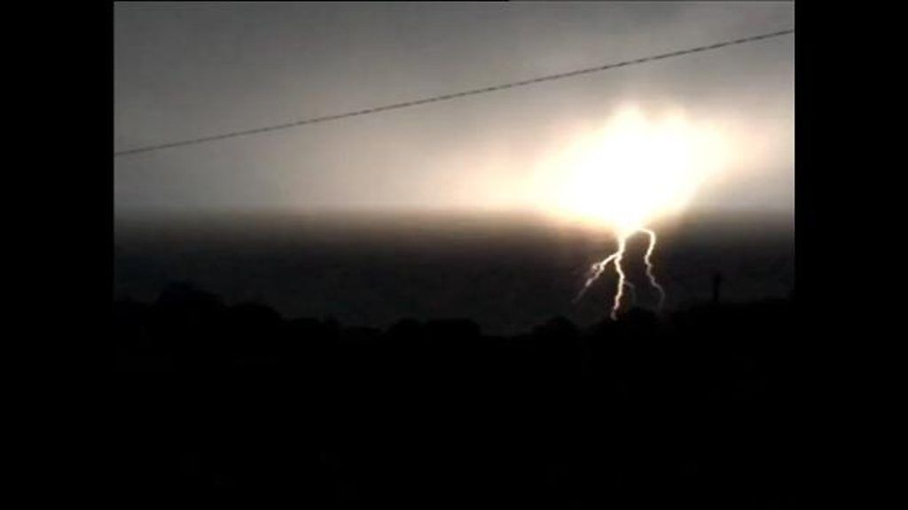 Lightning crackles as temperatures soar