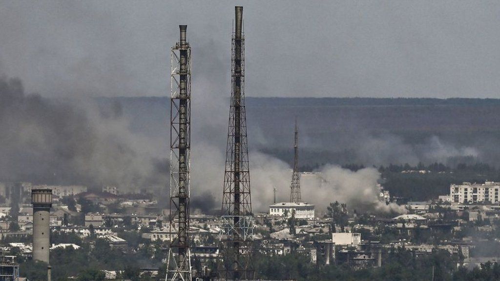 Smoke rises after a military strike on a compound of the Sevirodonetsk's Azot Chemical Plant