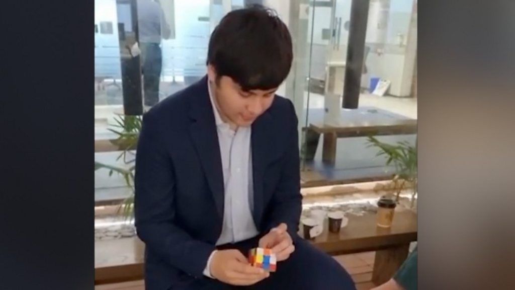 Suleman Dawood solves a Rubik's Cube in under 20 seconds