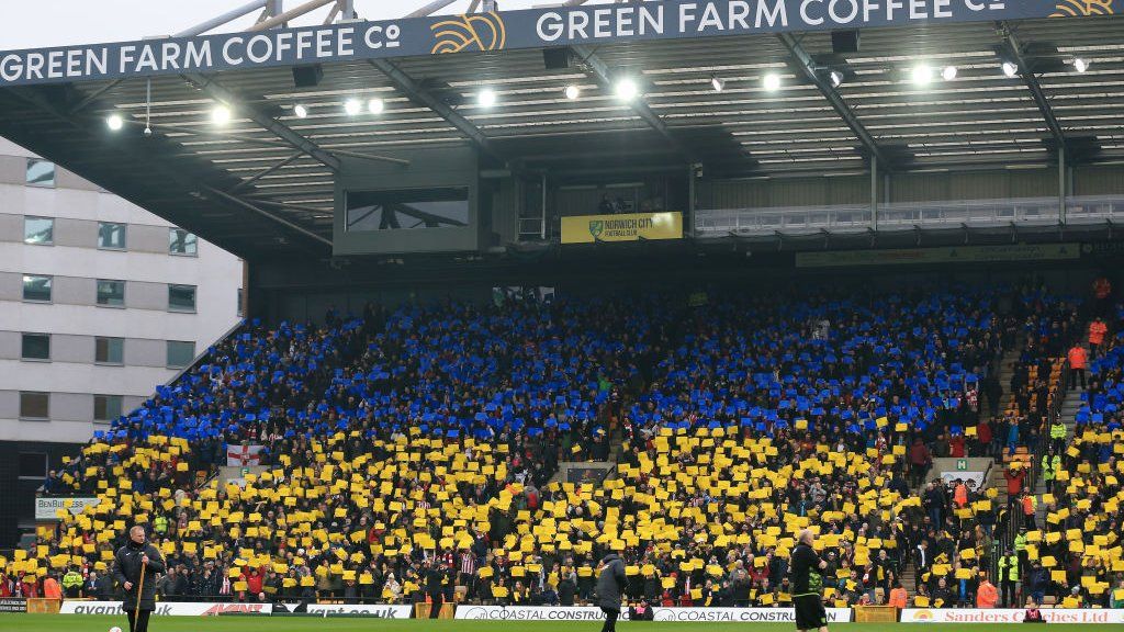 Norwich fans held up blue and yellow cards to produce a large-scale replica of the Ukrainian flag at Carrow Road