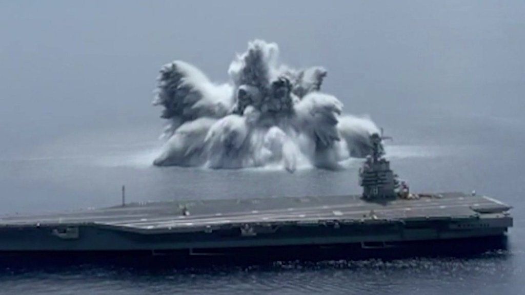 An explosion next to the USS Gerald R. Ford