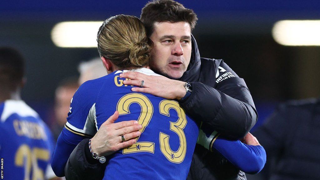 Conor Gallagher and Chelsea manager Mauricio Pochettino embrace