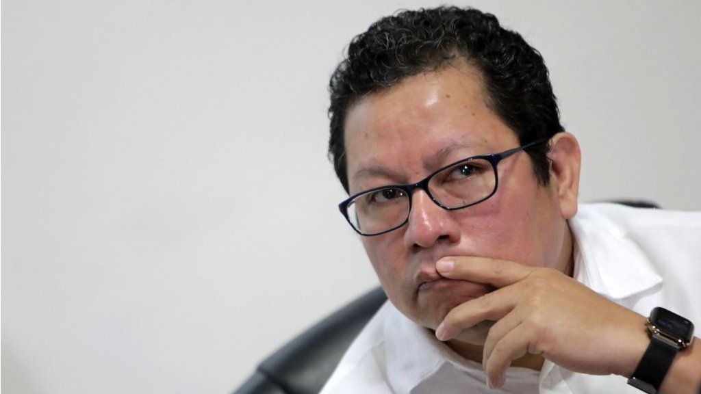 Nicaraguan journalist Miguel Mora gestures during a press conference in Managua, on December 13, 2019.