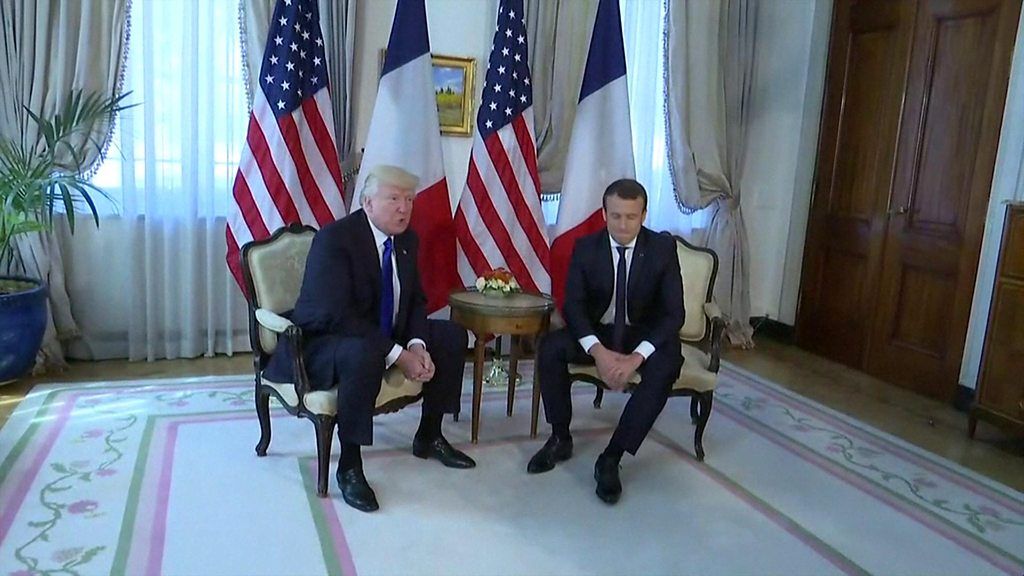 Donald Trump (L) meets Emmanuel Macron in Brussels, 25 May