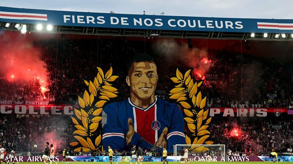 PSG fans display a tifo of Kylian Mbappe