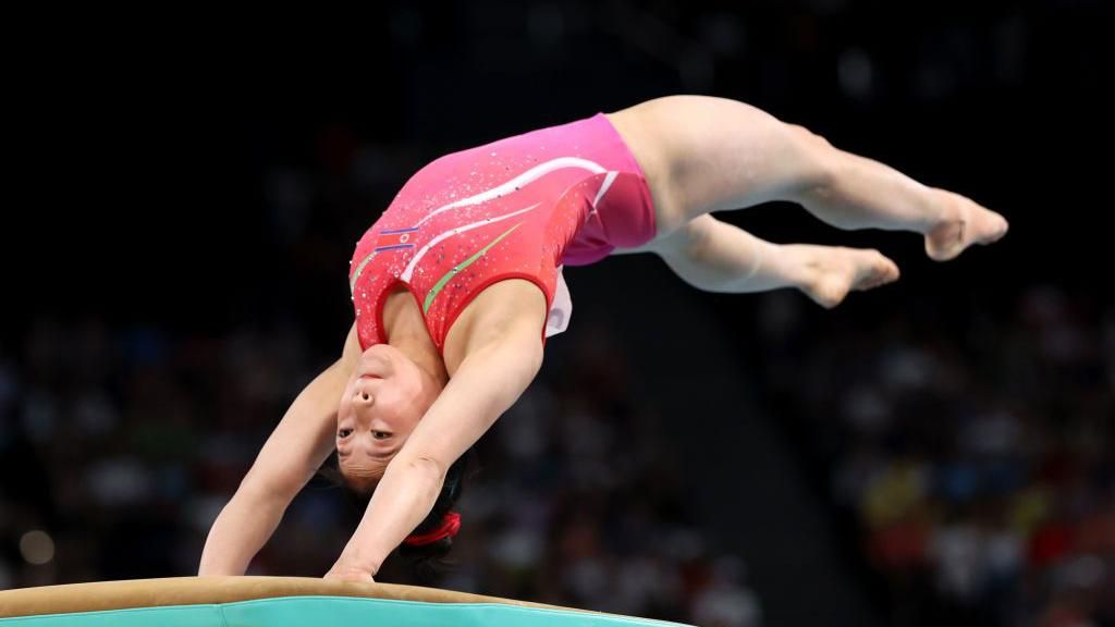 An Chang-ok performs a vault