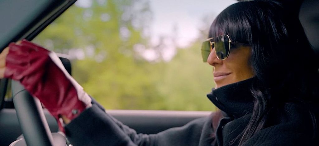 Claudia Winkleman driving a car on The Traitors