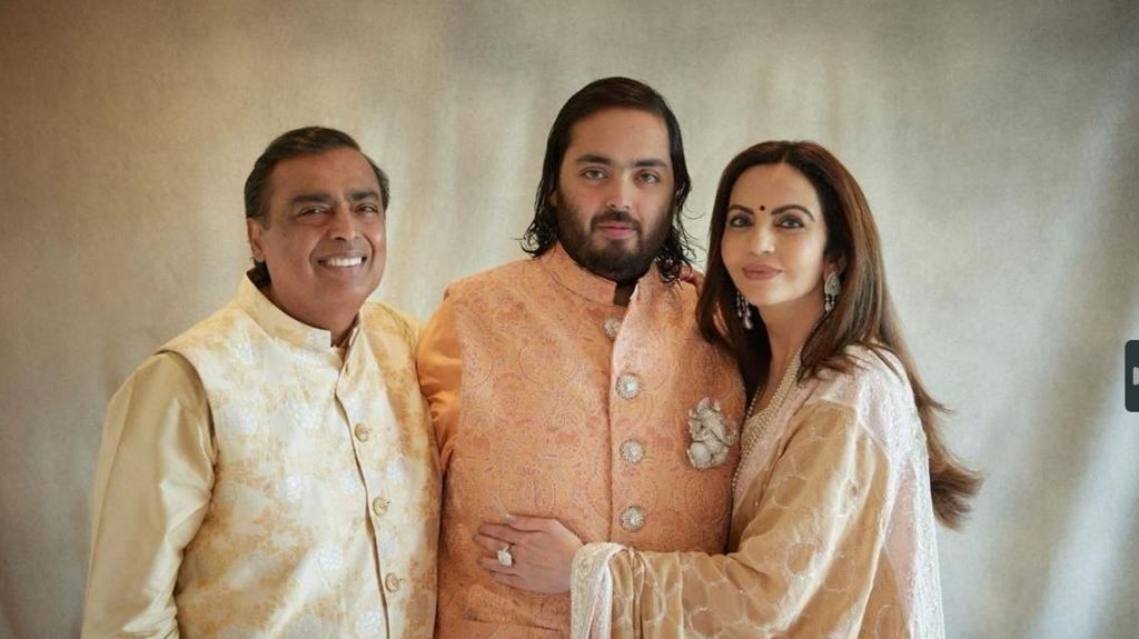 Mukesh Ambani, the Chairman of Reliance Industries, his wife Nita Ambani and their son Anant Ambani pose during the pre-wedding celebrations 