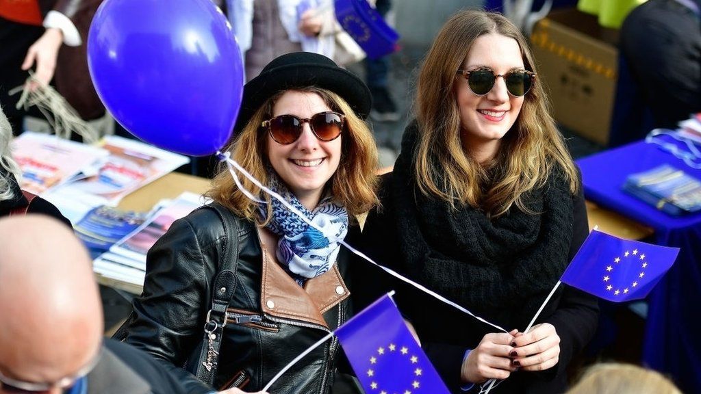 Young women waving flags of the European Union gather in the city centre for a pro-EU demonstration of the 'Pulse of Europe' movement on March 12, 2017 in Frankfurt, Germany. The movement sprung up in 2016 after the Brexit referendum result and the election of U.S. President Donald Trump