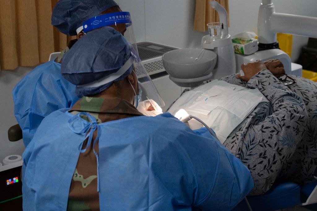 Members of the South African military perform surgery onboard the Chinese hospital ship in Cape Town - Monday 26 August 2024