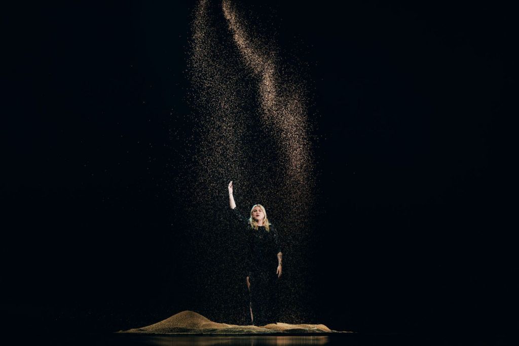 French singer Louane performs at Eurovision under a constant stream of sand