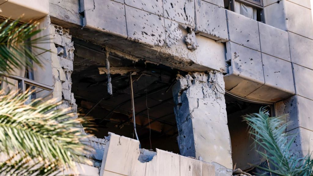 Exterior damage to the Ramada Plaza hotel in Beirut following an Israeli strike
