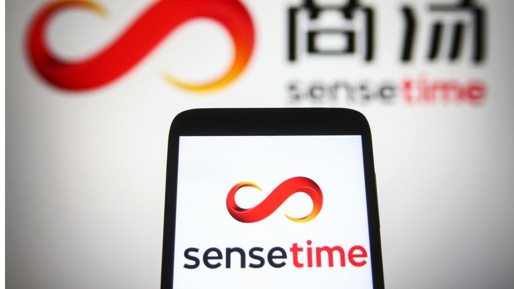 SenseTime logo displayed on a smartphone