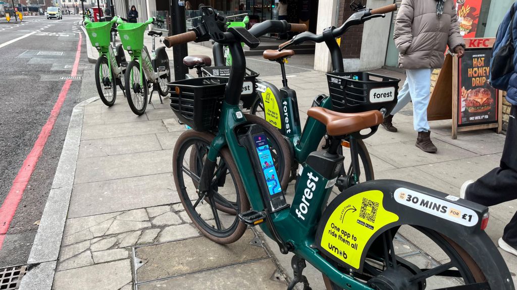 A Forest hire bike is on the pavement