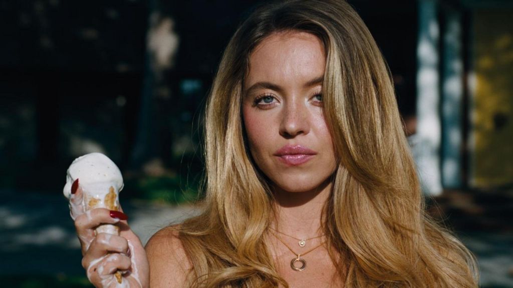 Sydney Sweeney holding an ice cream