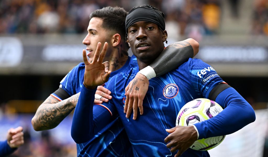 Noni Madueke celebrates his hat-trick against Wolves.