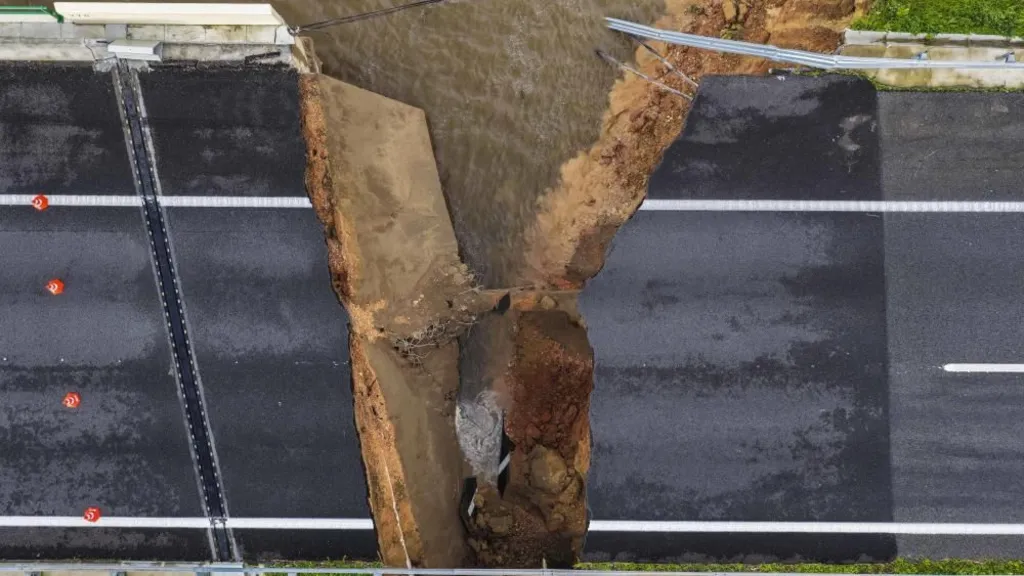 A section of motorway collapsed into a river