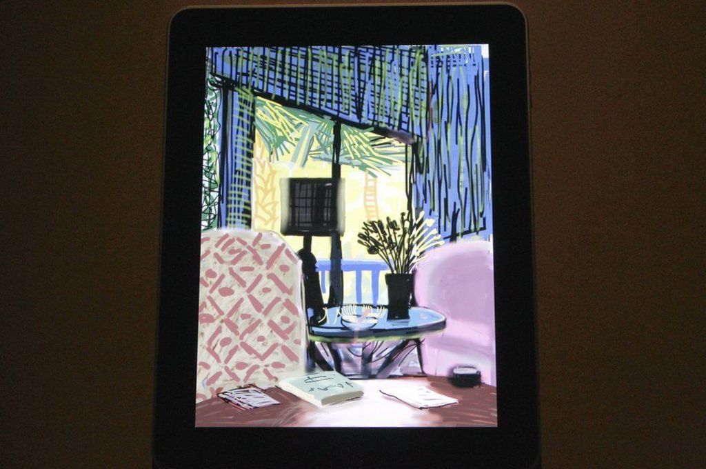 David Hockney artwork on an iPad. The painting is of a room with blue walls and red chairs. It is a still life.