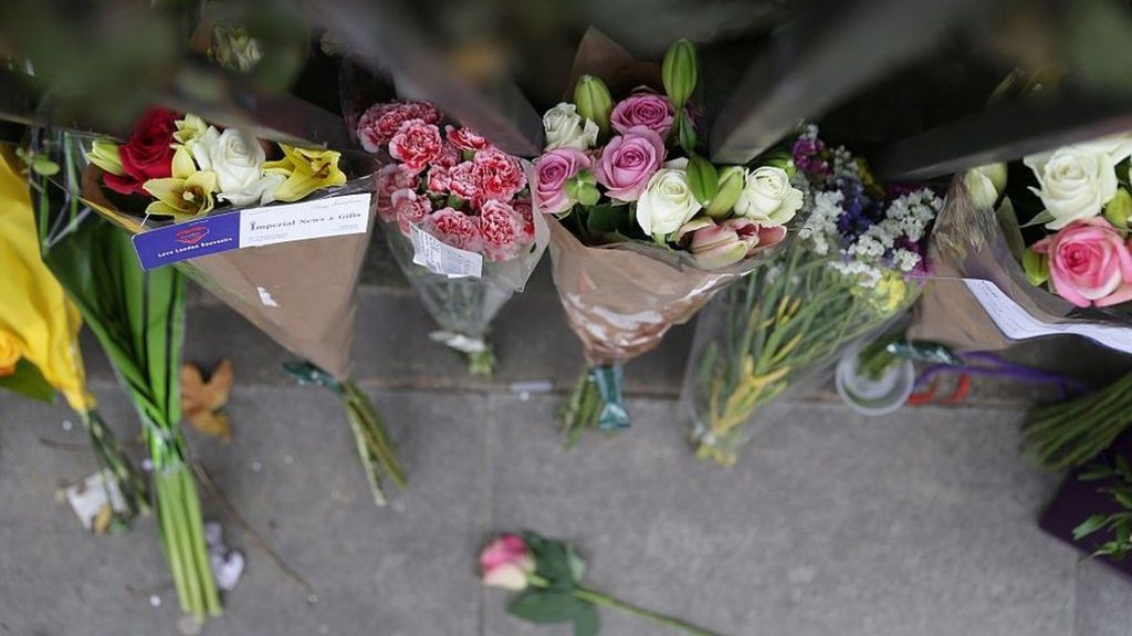 Flowers laid after a tourist stabbing in Russell Square