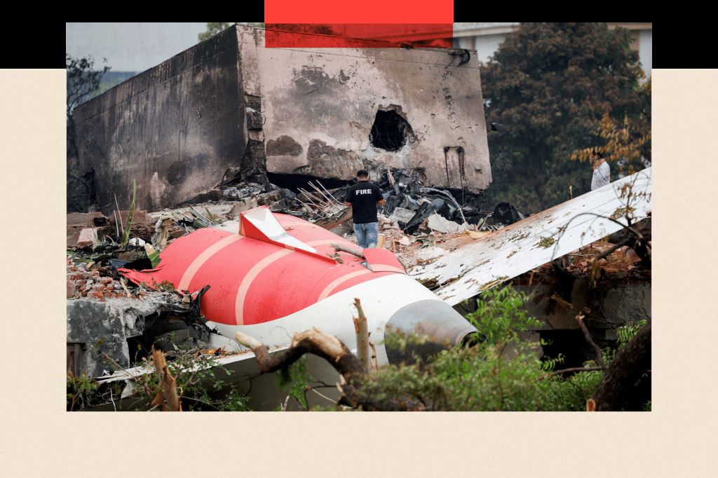 A firefighter stands next to the crashed Air India Boeing 787-8 Dreamliner aircraft, in Ahmedabad, India, on 13 June 2025.