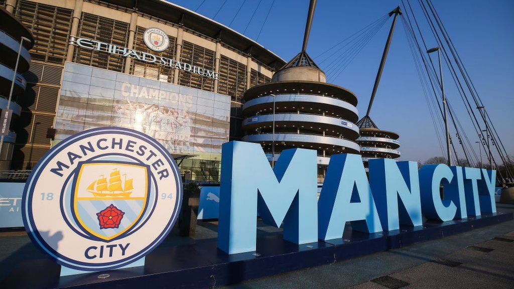 A Man City badge outside Etihad Stadium