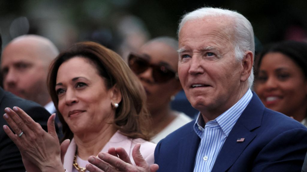  U.S. President Joe Biden claps hands next to U.S. Vice-President Kamala Harris while hosting a Juneteenth concert on the South Lawn at the White House in Washington, D.C., U.S. June 10, 2024.