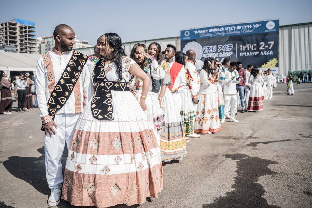 Couples dressed in a traditional attire line up ahead of a mass wedding in Addis Ababa, Ethiopia
