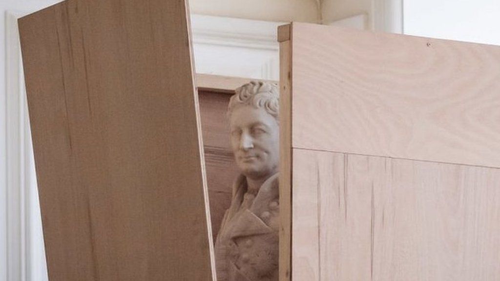 Statue of enslaver and Waterloo war hero Sir Thomas Picton is boxed up in preparation for its removal from Cardiff City Hall on July 24, 2020 in Cardiff