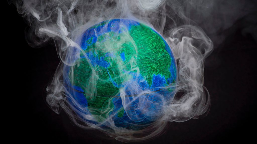 Model of the Earth with smoke coming off it