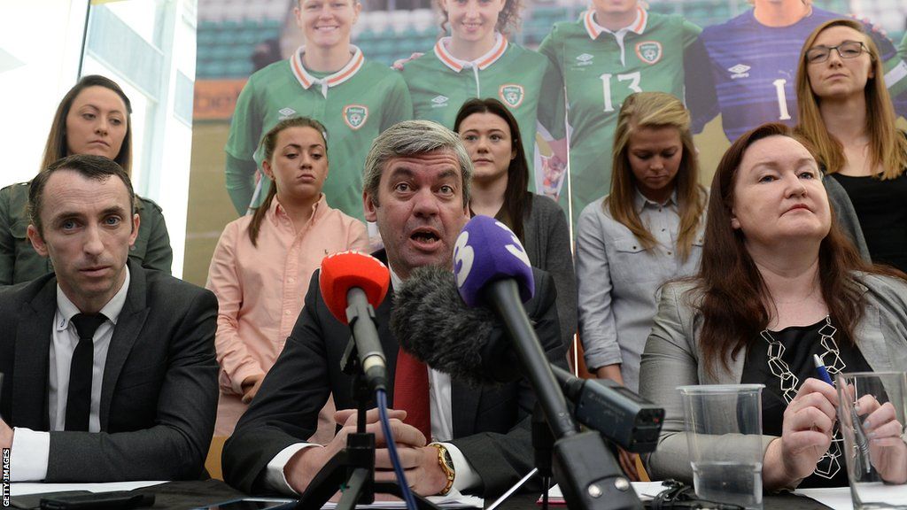 PFAI solicitor Stuart Gilhooly (centre) was a key figure in the team's stand