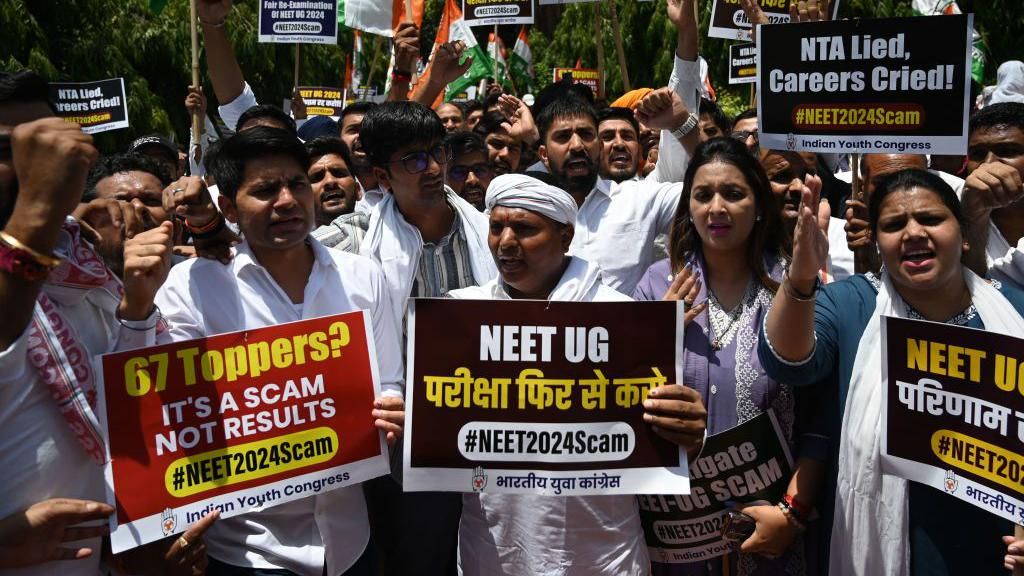 JUNE 9: Indian Youth Congress workers protest against the alleged irregularities in the NEET-UG examination, at IYC office, on June 9, 2024 in New Delhi, India. The National Eligibility-cum-Entrance Test (NEET-UG) has faced several allegations of irregularities and paper leak after 67 students topped the exams this year scoring a percentile of 99.997129. (Photo by Salman Ali/Hindustan Times via Getty Images)