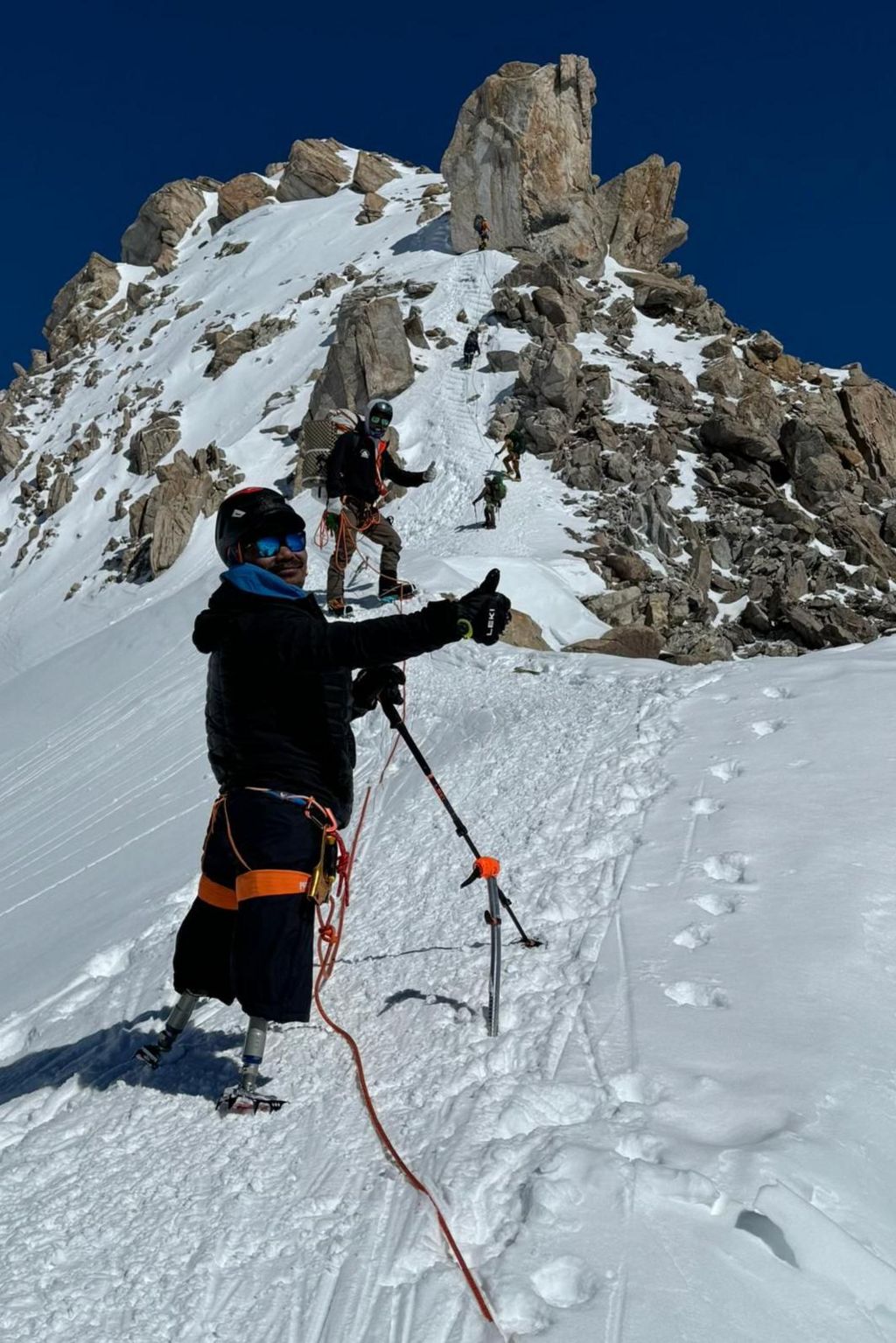 Hari Budha Magar climbing Denali with support team