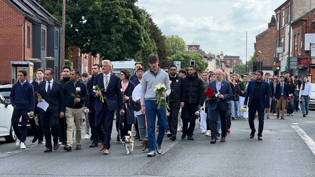 The victims' families walking together