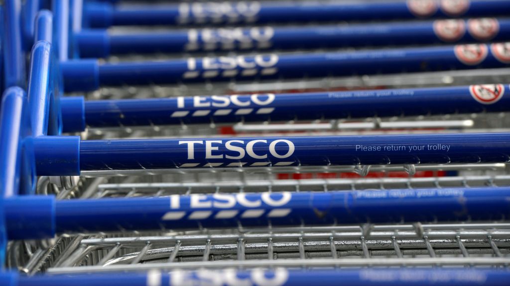 Tesco chief executive Dave Lewis sees pay fall 10%
