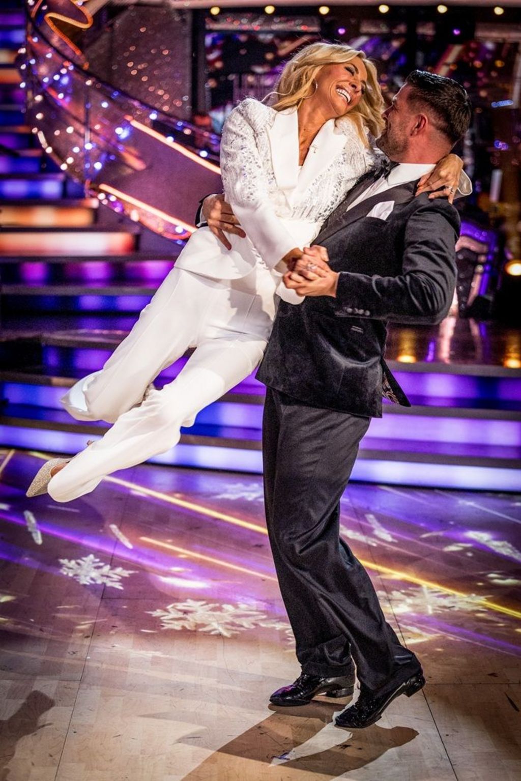 Daly being swept of her feet and spun around by Strictly pro dancer Aljaž Škorjanec