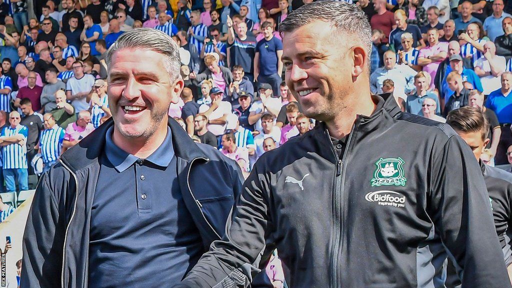 Ryan Lowe (left) and Steven Schumacher on the touchline while at Plymouth Argyle